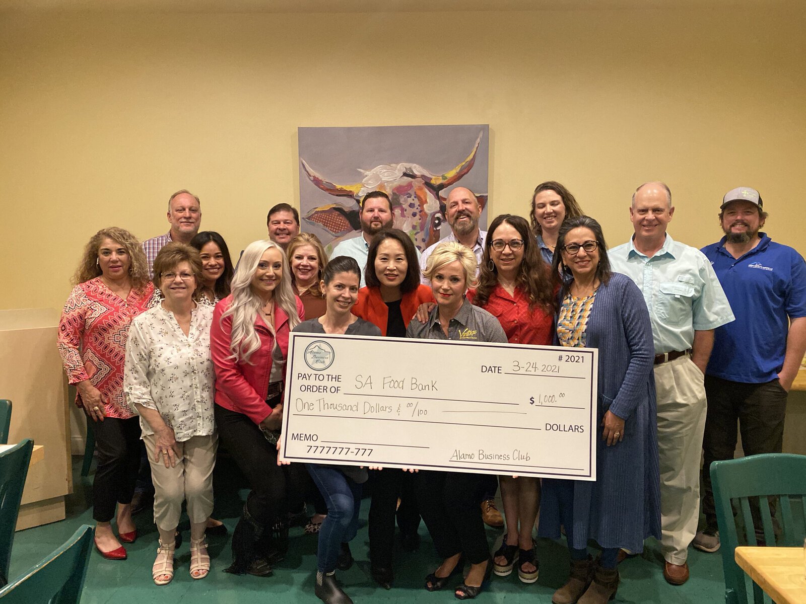 Alamo Business Club members presenting a donation to the San Antonio Food Bank