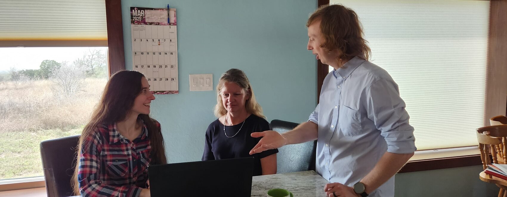 Preston and Brianna Allen meeting with a local business client