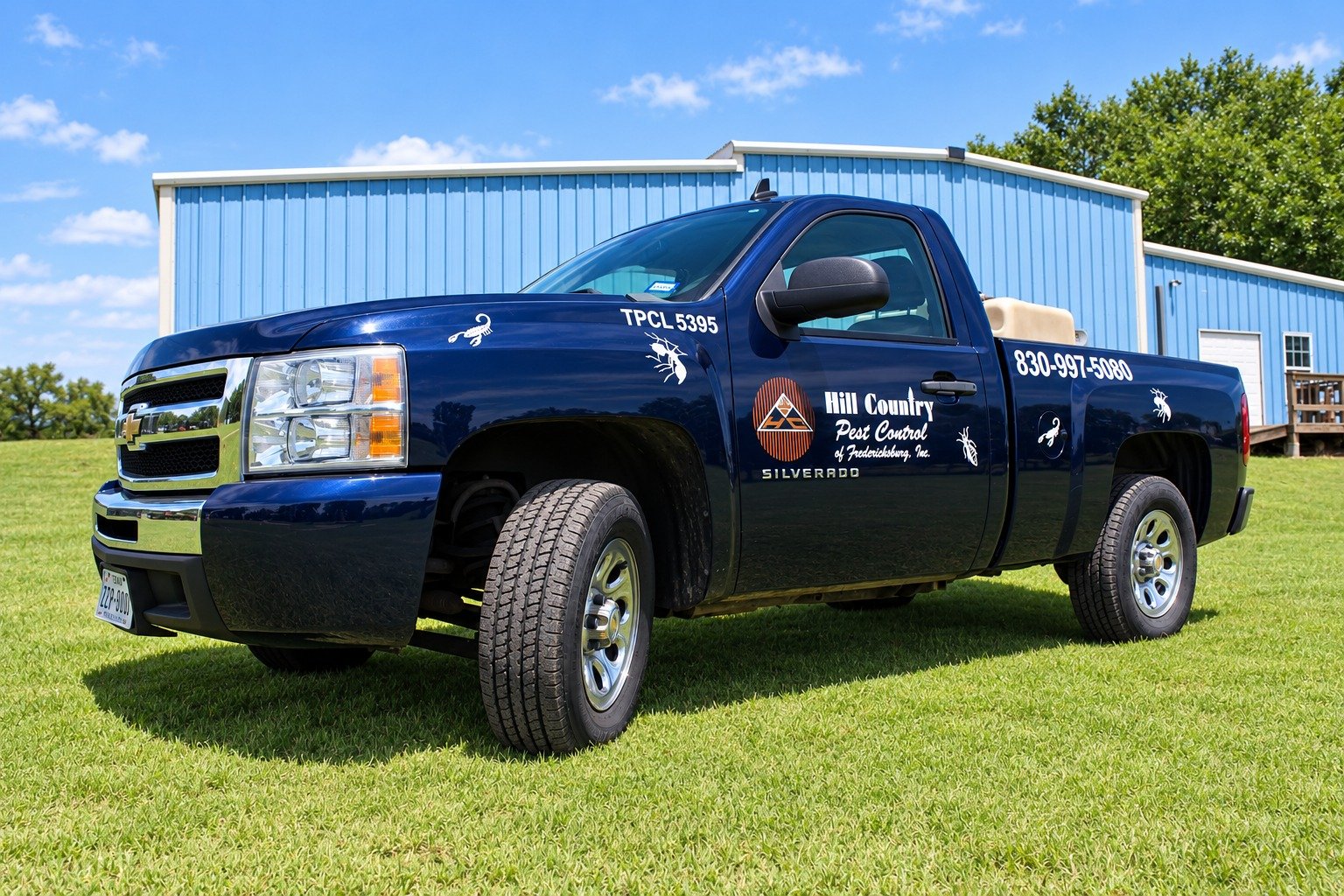 A branded Hill Country Pest Control service truck, license TPCL 5395
