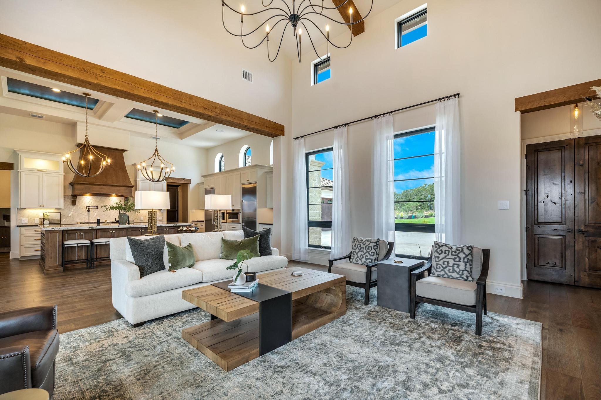 Whole-home remodel by Marquis Builders, kitchen and great room