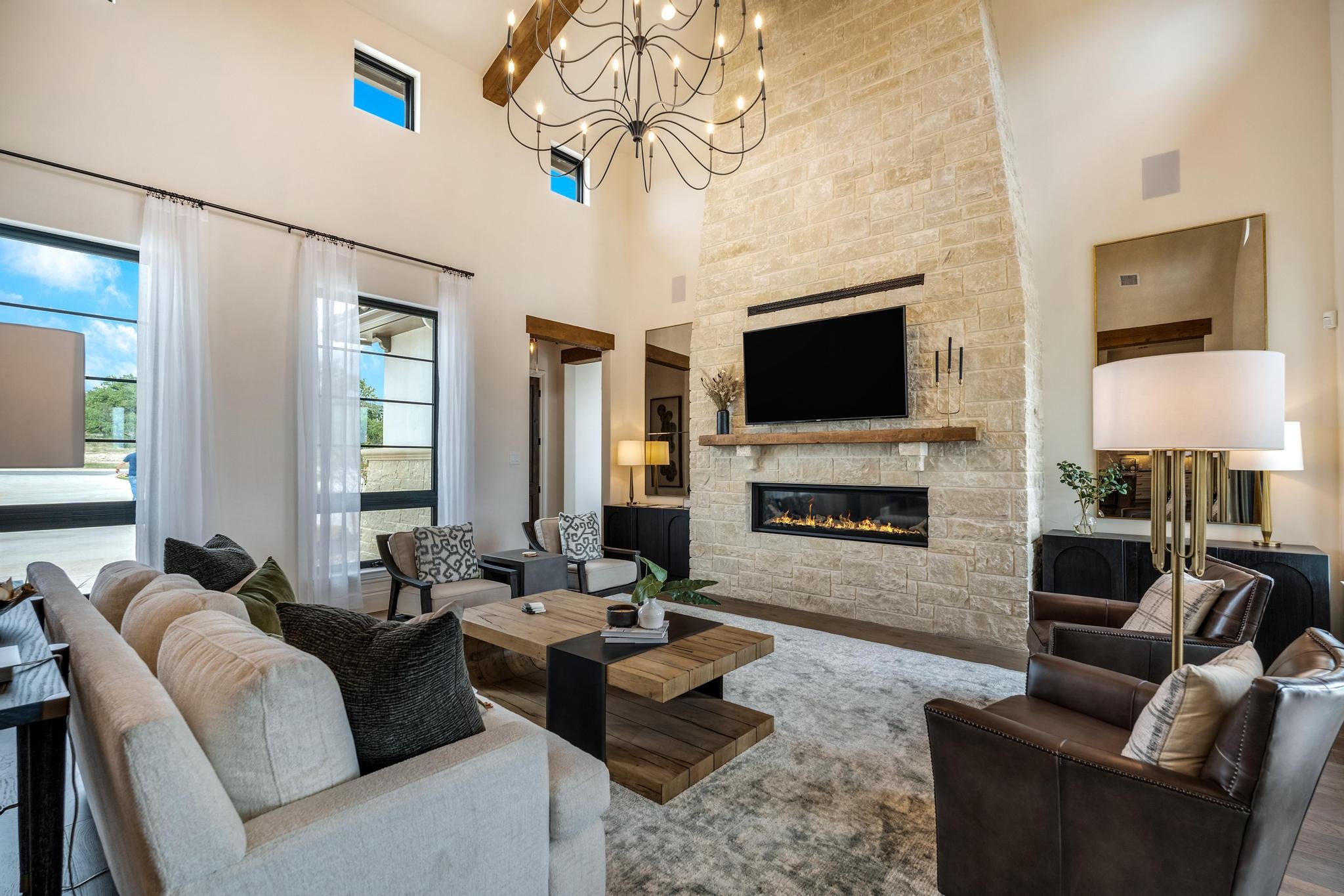 Pecan Springs home kitchen with island and custom cabinetry