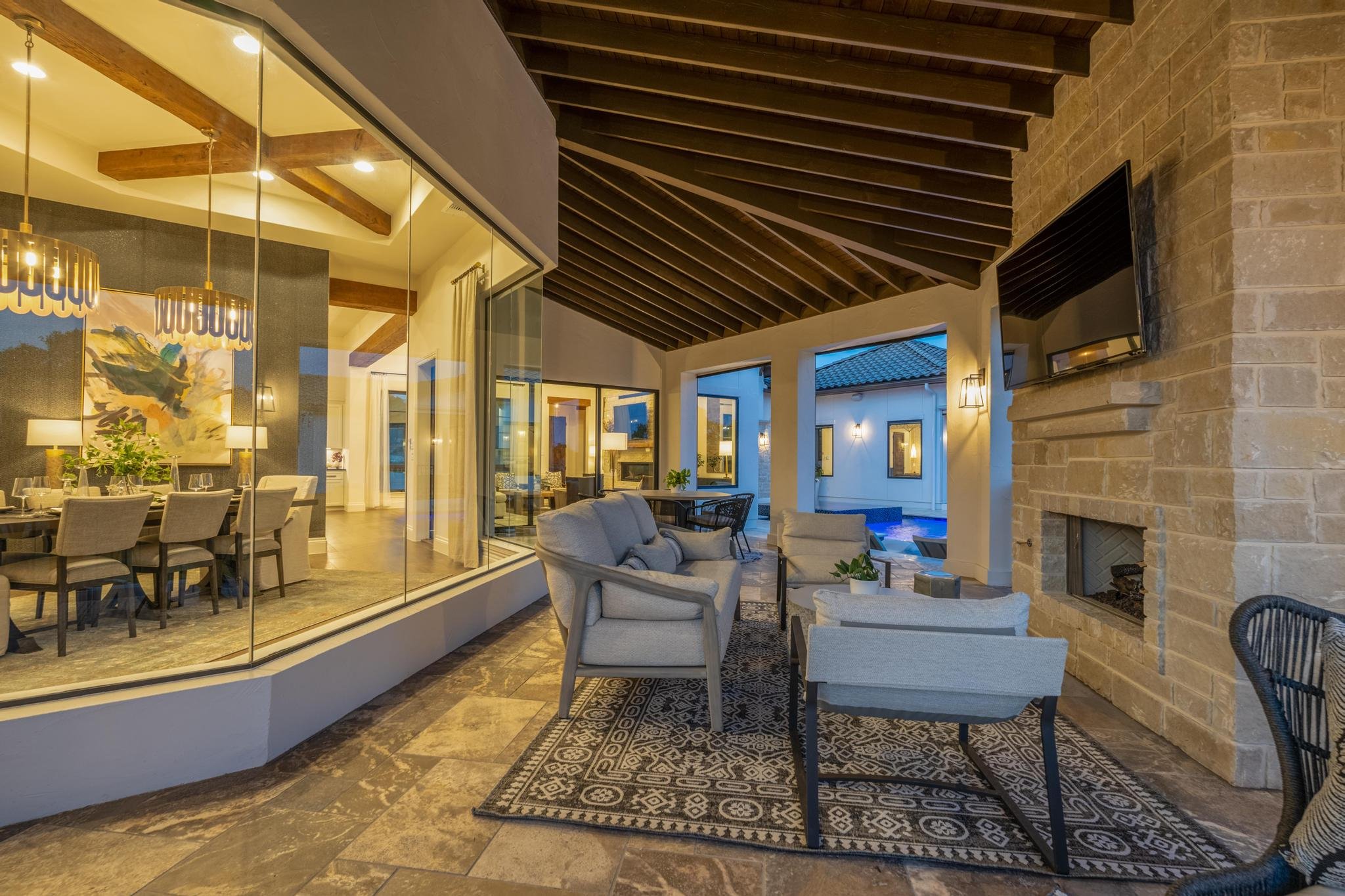 A Marquis Builders custom home at twilight in the Texas Hill Country