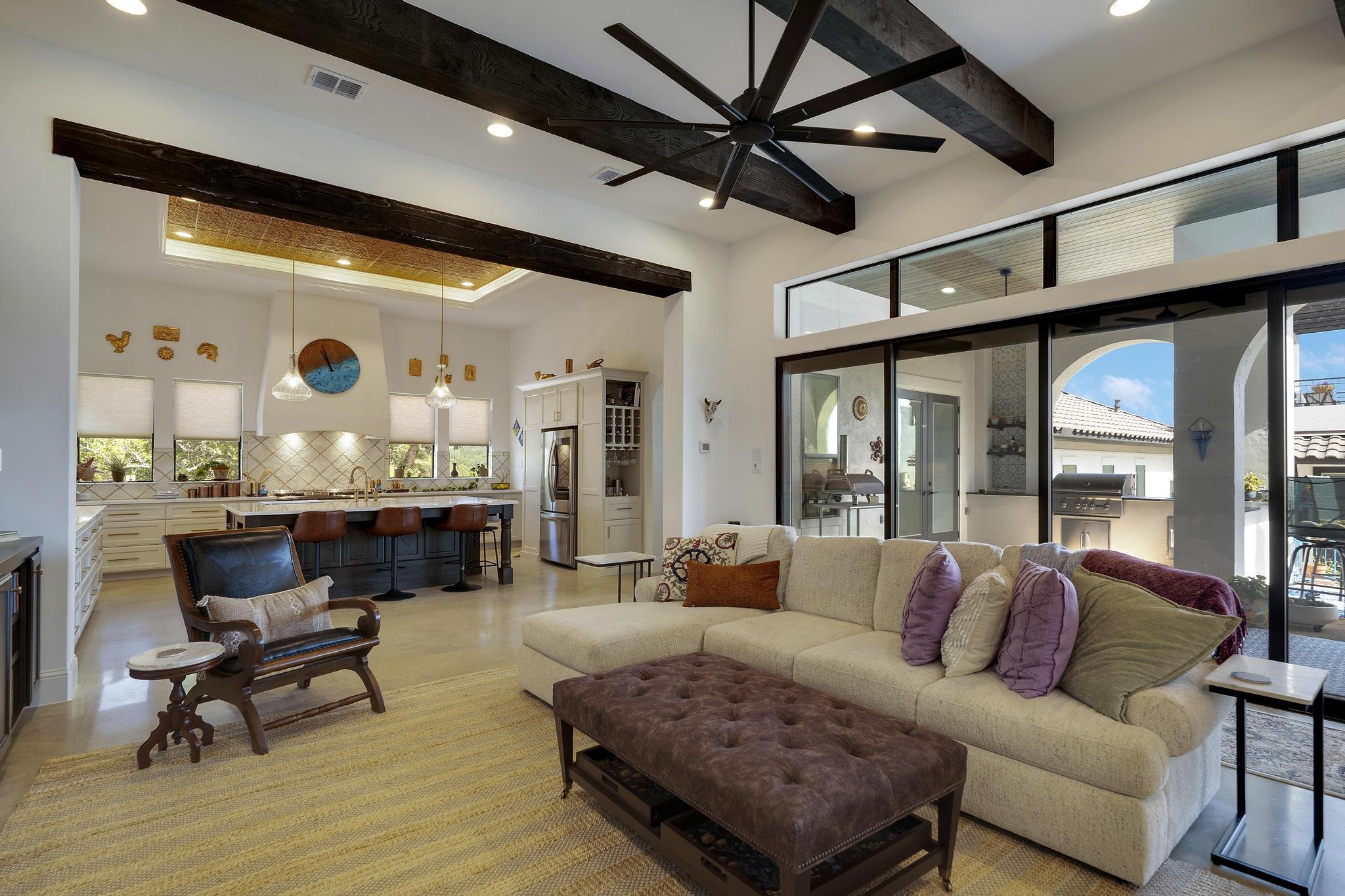 Whole-home remodel by Marquis Builders, kitchen and great room