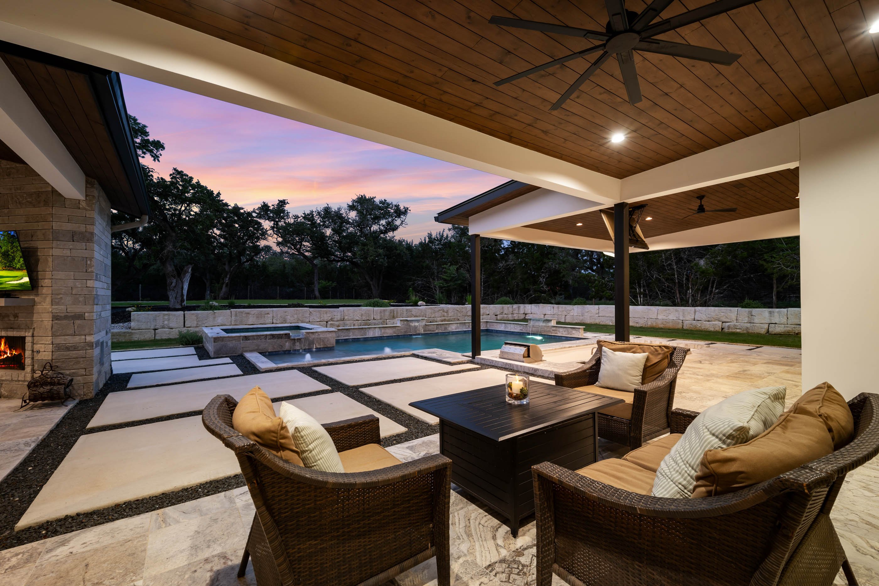 A Marquis Builders custom home at twilight in the Texas Hill Country