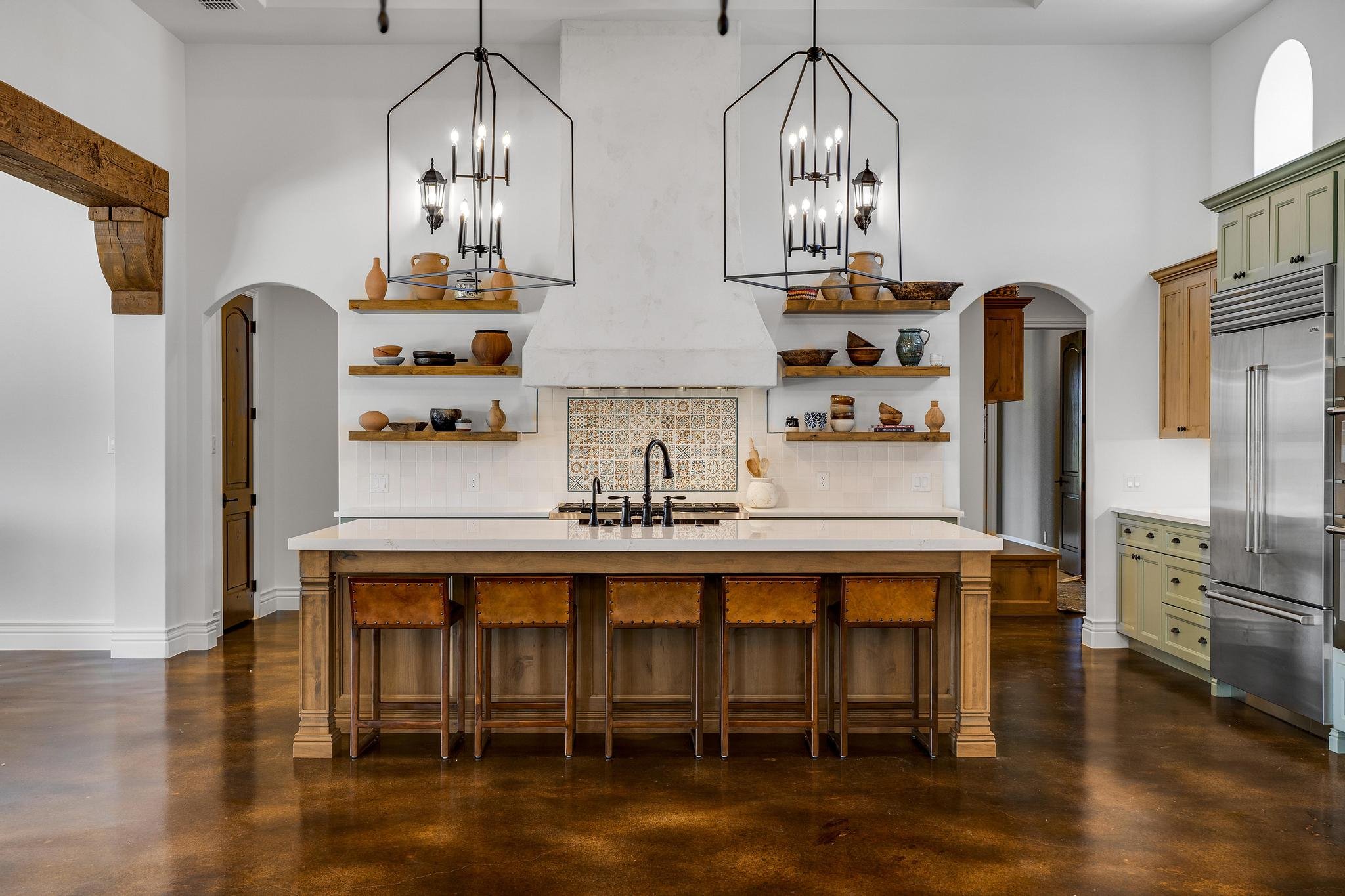Whole-home remodel by Marquis Builders, kitchen and great room