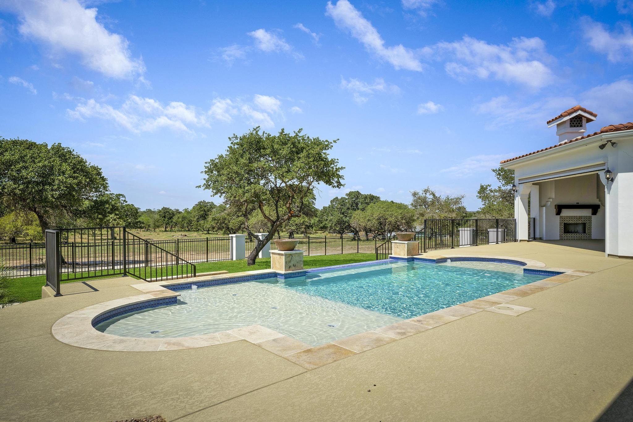 A Marquis Builders custom home with a pool in the Texas Hill Country near Fredericksburg