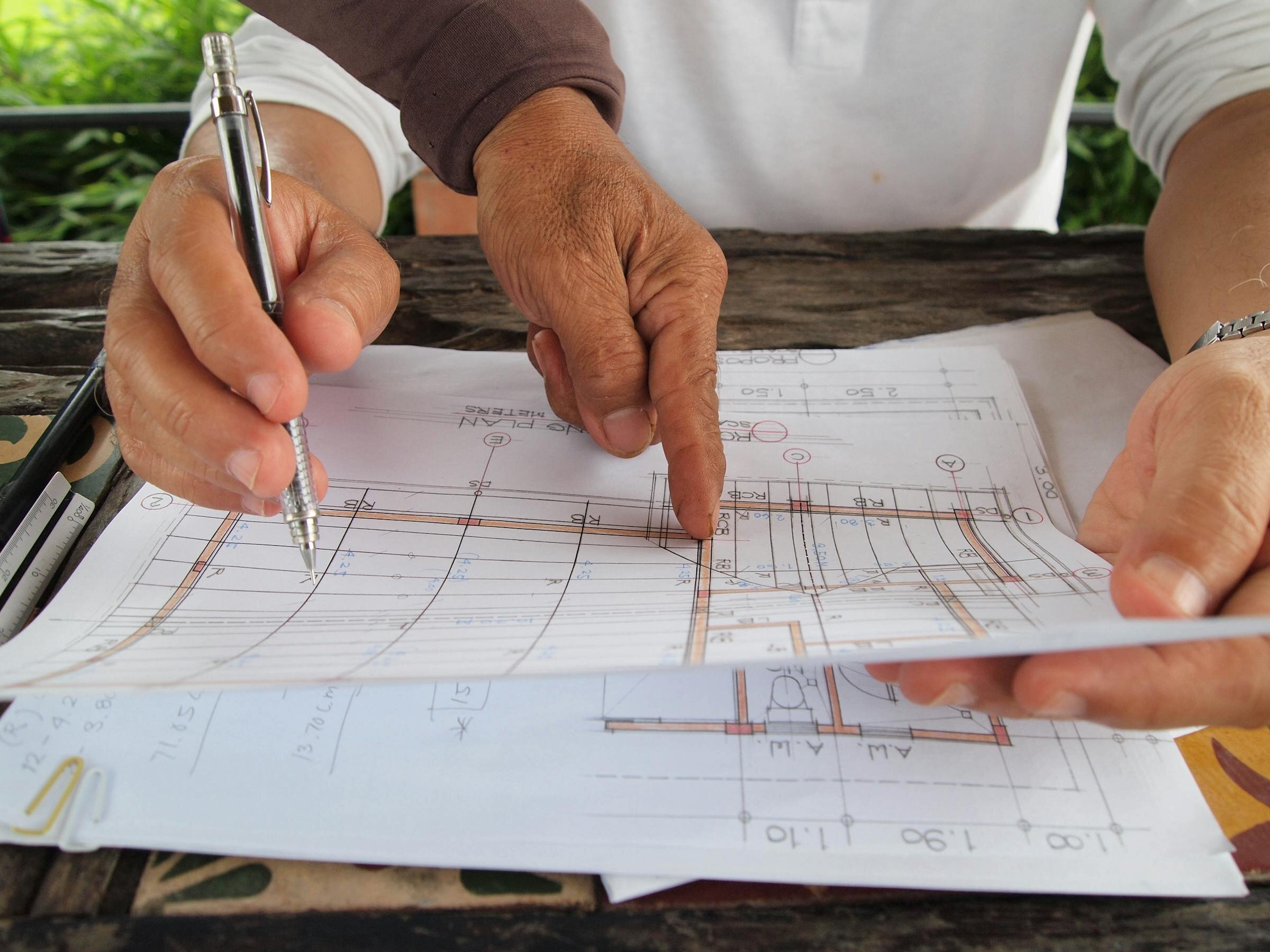 Reviewing the blueprints for a Marquis Builders custom home